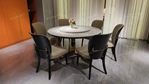 Mirror-Polished Steel Dining Table with White Marble Top and Woven Leather Accents